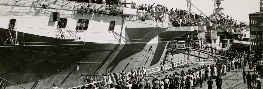 HMS Glory docked at Melbourne, VPRS 8357/P1 Unit 2, HMS Glory Black and white photo of HMS Glory docked at Melbourne